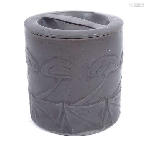 ARCHIBALD KNOX for LIBERTY & CO - an early 20th century Art Nouveau Tudric pewter lidded biscuit