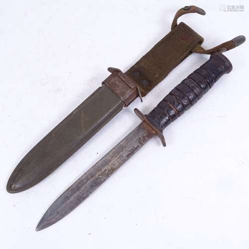 A Second World War Period American M3 combat fighting knife, by H Boker & Co, with US M8 BM & Co