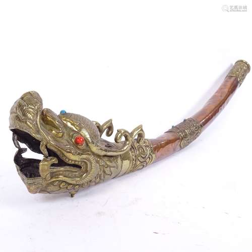A Chinese copper and brass dragon horn, mounted with cabochon stones, length 42cm