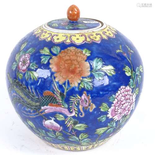 A Chinese famille rose phoenix ginger jar and cover, blue ground with floral decoration and 4