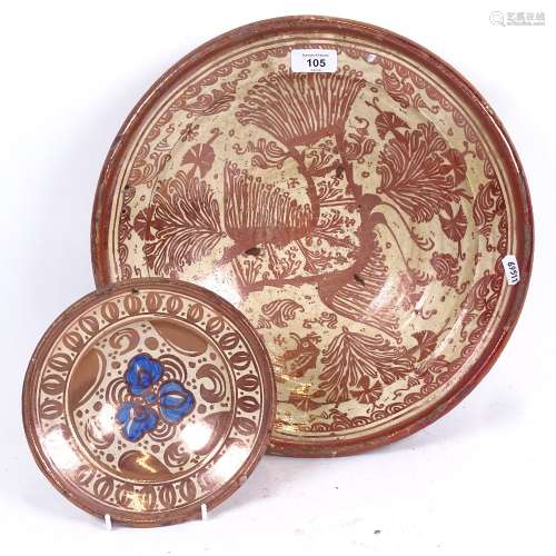 A 17th century Hispano-Moresque Spanish copper lustre faience phoenix bowl, and a similar smaller