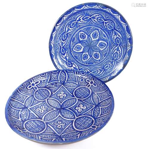 2 Moroccan blue and white pottery chargers, largest diameter 38.5cm, 1 A/F, (2)