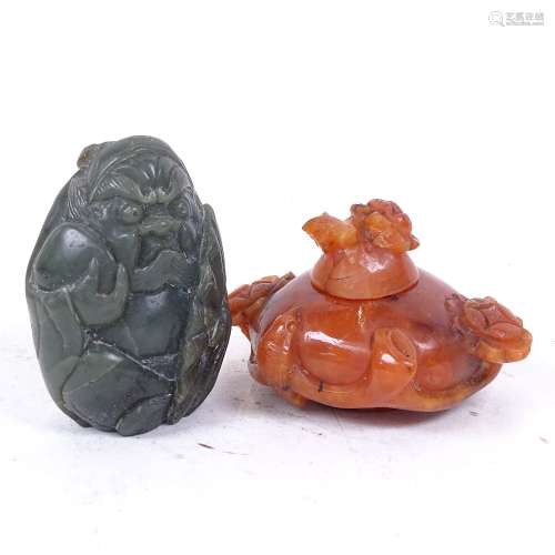 A Chinese carved and polished jadeite figure, and a Chinese carnelian pot and cover, height 5.5cm (