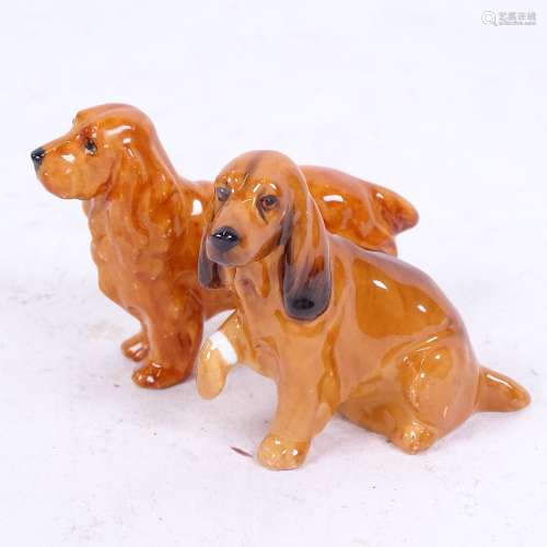 A Royal Worcester Cocker Spaniel dog, model no. 2944, and a Royal Doulton Spaniel, height 6cm (2)