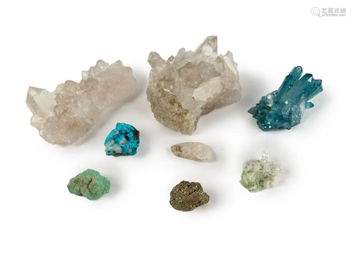 GROUP OF EIGHT ROUGH CRYSTAL STONES