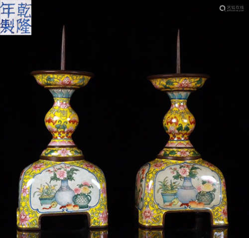 PAIR OF YELLOW ENAMELED GLAZE CANDLE HOLDERS