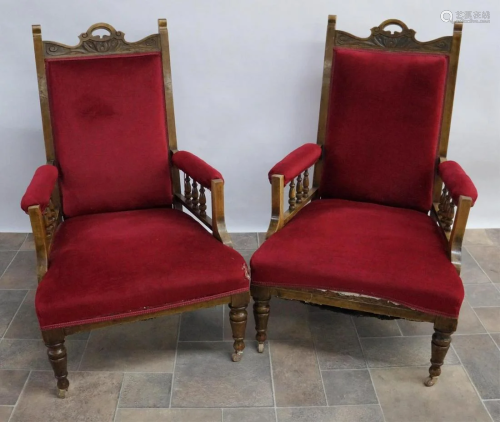 A Pair of Oak Framed Open Arm Chairs