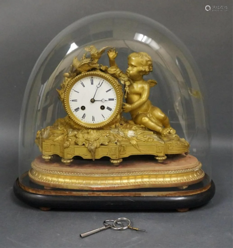 An Antique French Brass Mantle Clock