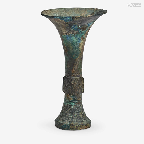 A Chinese archaic bronze gu-form beaker vase, Shang