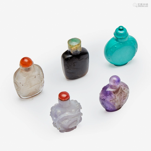 A group of five assorted Chinese carved hardstone snuff