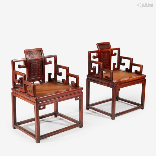 A pair of Chinese hardwood armchairs, probably Qing