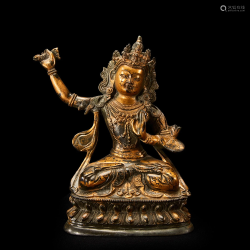 A Sino-Tibetan style bronze figure of Manjusri,