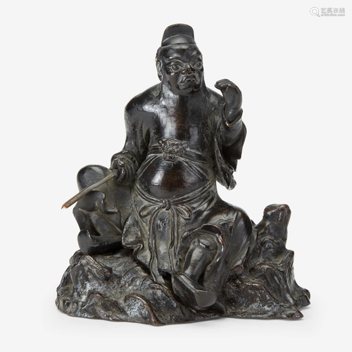 A Chinese patinated bronze 