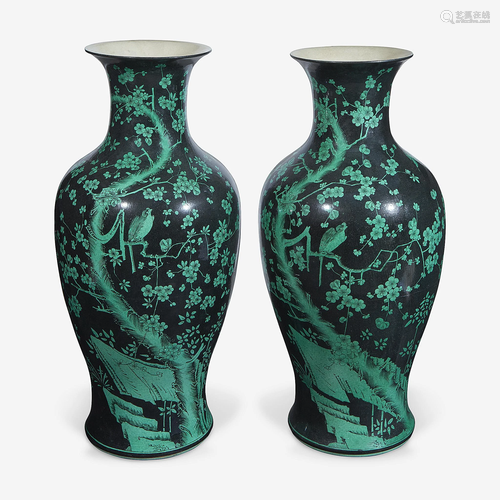 A pair of famille noir-decorated porcelain baluster