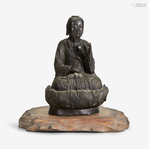 A Chinese bronze seated Daoist deity, probably Ming