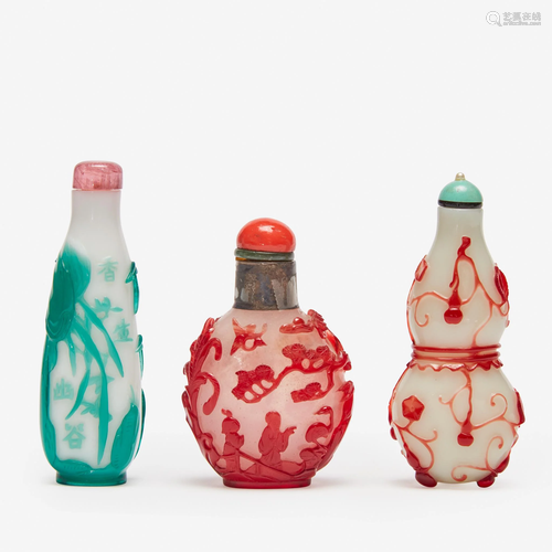 Three Chinese glass overlay snuff bottles,