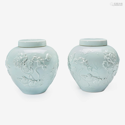 A pair of Chinese molded and slip-decorated porcelain