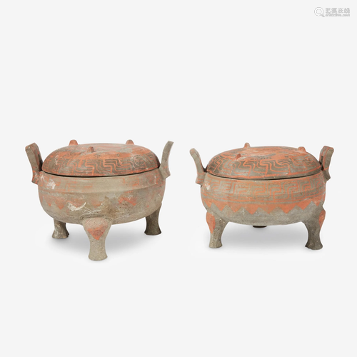 A pair of Chinese painted grey pottery covered tripod