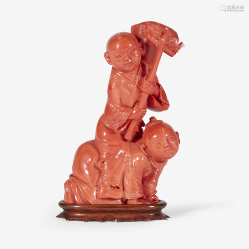 A Chinese finely-carved red coral two-boys group, 20th