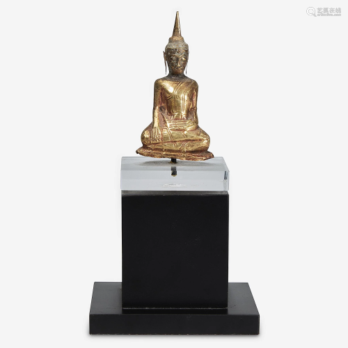 A small Thai gold repousse figure of Buddha Shakyamuni,