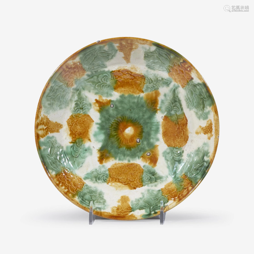 A Chinese sancai-glazed molded ceramic dish, Liao