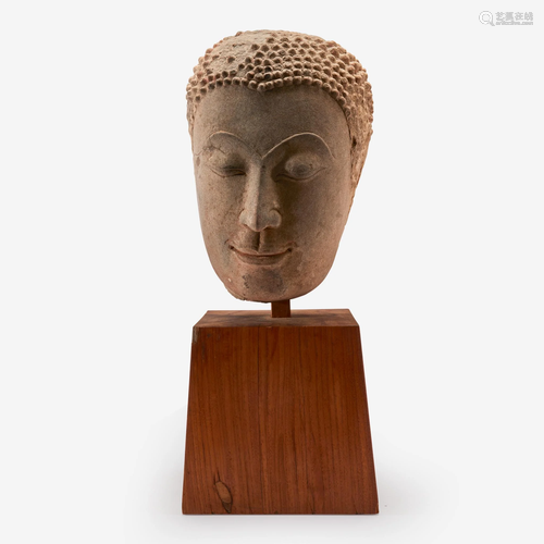 A Thai carved sandstone head of Buddha, 15th-17th