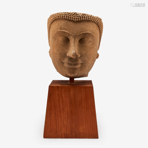 A Thai carved sandstone head of a Buddha,