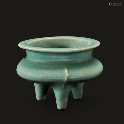 A Chinese celadon-glazed tripod censer,