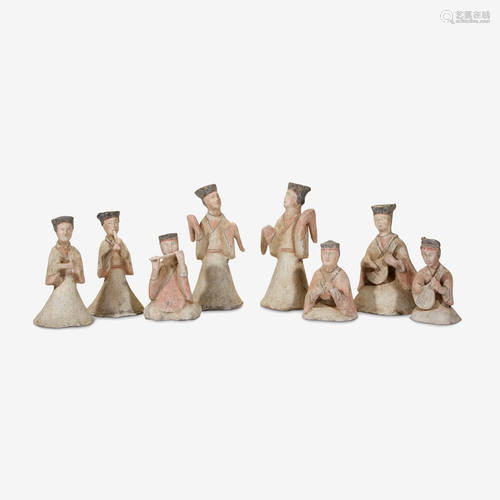 A group of eight painted pottery musicians and dancers,