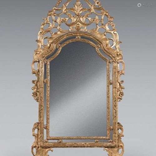 Miroir dans un double encadrement en bois redoré, …