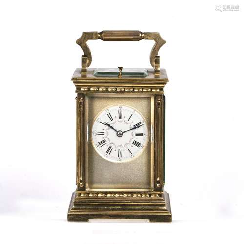 French repeater carriage clock with striking movement, enamel dial and Roman numerals, in a fluted