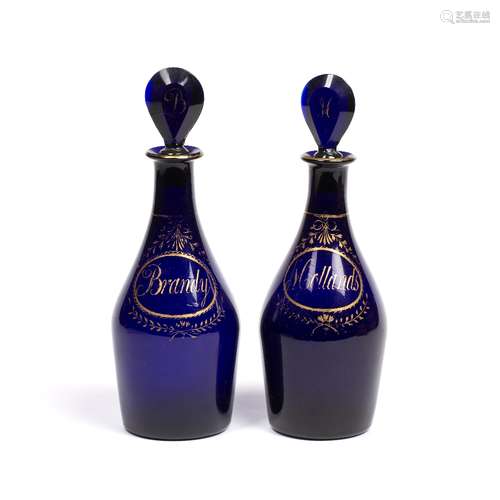 Pair of Bristol blue glass decanters early 19th Century, marked ''Brandy'' and ''Hollands'' each