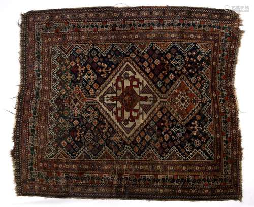 Caucasian blue ground rug with central ivory medallion and two smaller medallions within a foliate