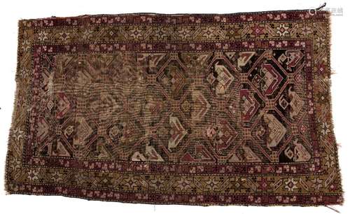 Persian rug with geometric stylised central panel and foliate border, 158cm x 89cm