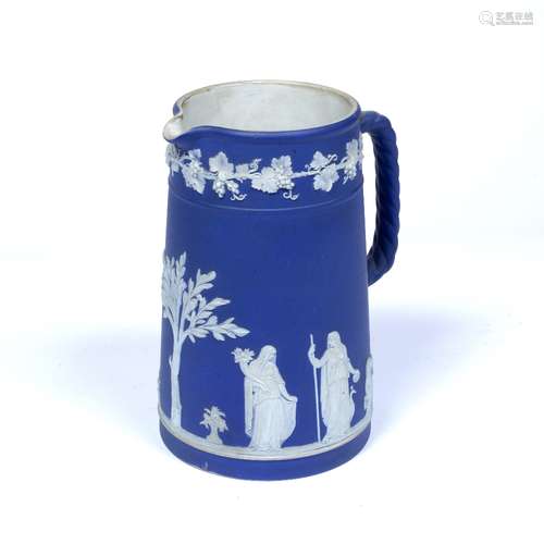 Wedgwood Etruria jug Jasperware on blue ground, with impressed numerals to the base, 20.5cm high