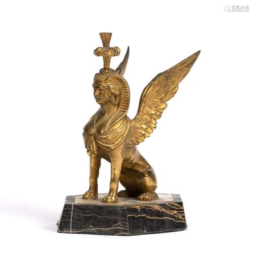 Ormolu sphinx 19th Century, of classical form and on a shaped marble base, 16cm across x 16.5cm