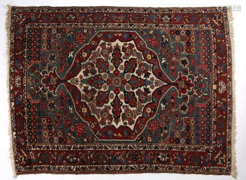 Hamadan blue ground rug with central foliate shaped medallion, and red ground foliate border 194cm x