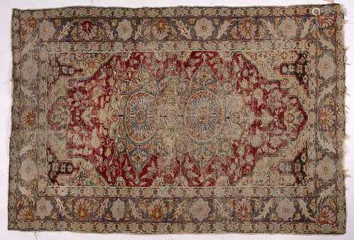 Persian red ground rug with central foliate medallion and banded border, 123cm x 82cm