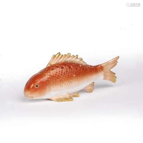 Jacob Petit porcelain model carp French late 19th Century, the fish with gilt fins and pierced body,