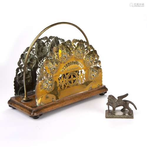 Brass newspaper or letter rack and a bronzed metal model of a gryphon (2)