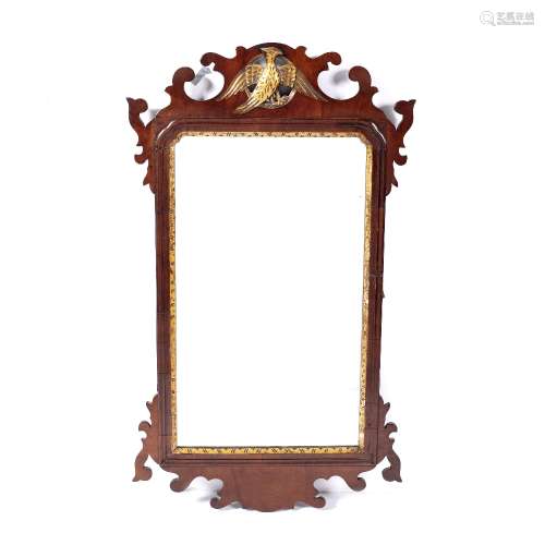 Mahogany fret wall mirror with gilt eagle to the top, 85cm x 48cm