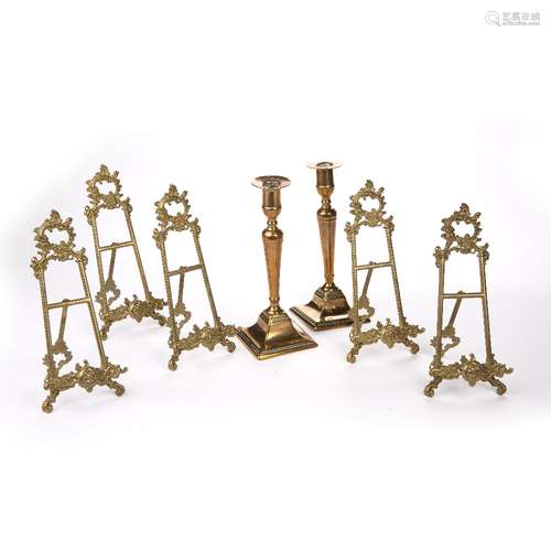 Pair of brass candlesticks 19th Century, 24cm and five gilt metal stands (7)