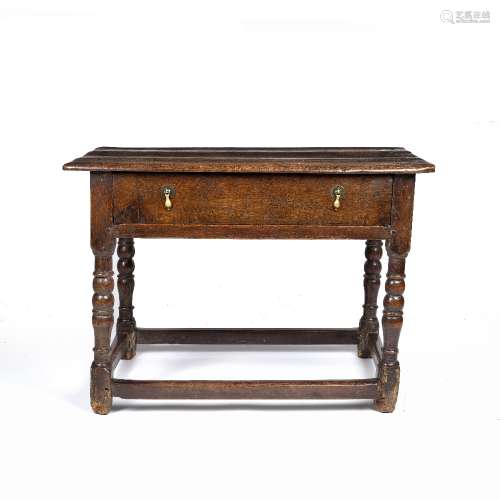 Oak side table 17th/18th century, with a single drawer to the centre, 63cm high x 89cm across