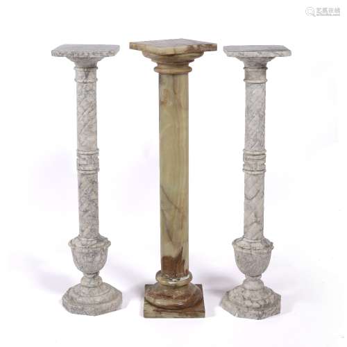 Pair of marble stands with spiral twist columns, 95cm high, 21cm across and an olive onyx column