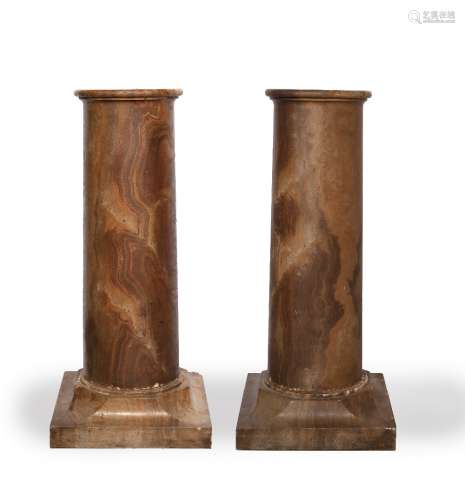 Pair of Giallo Antico marble columns Italian, each having a cylindrical column and square bases,