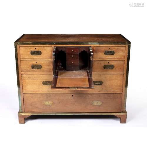 Campaign style chest of drawers late19th/early 20th Century, oak with brass banding, the central