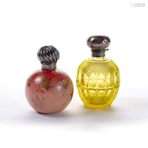 Two Victorian perfume or scent bottles with silver mounts one globular bottle with hand painted