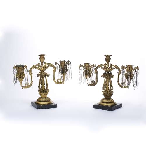 Pair of table two branch candelabra 19th Century, probably French, each on a marble base, with