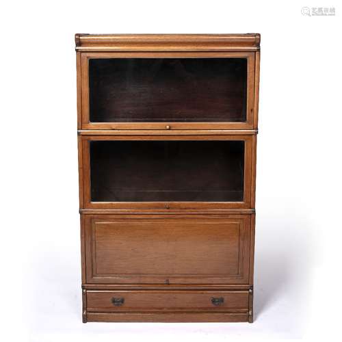 Globe Wernicke style three tier bookcase mahogany, two glazed sections over a cupboard and a drawer,