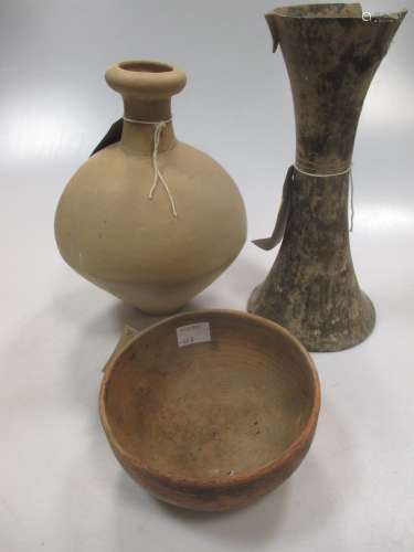 A group of three Chinese pottery vessels, Neolithic type, comprising Gu vase 23.5cm high; hemi-